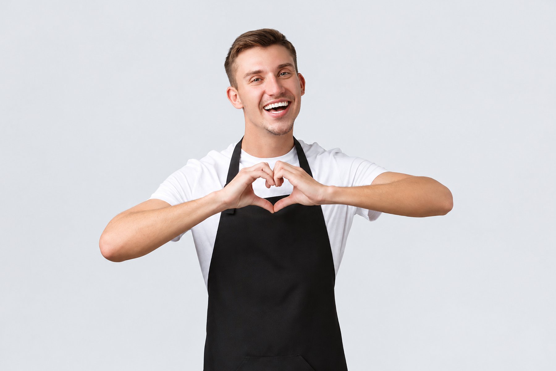 Barista mit Handherz